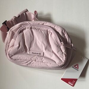 Reebok | Light Pink Crossbody Bag Travel
Sack Zipper compartments Size Shown NWT